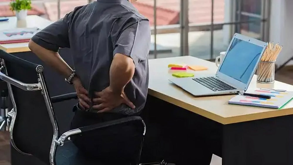The Cost of Sitting: How Poor Workplace Ergonomics Affects Employee Productivity and Business ROI