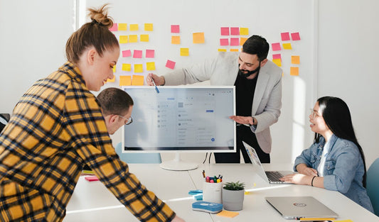 Image of a instructor teaching his colleagues
