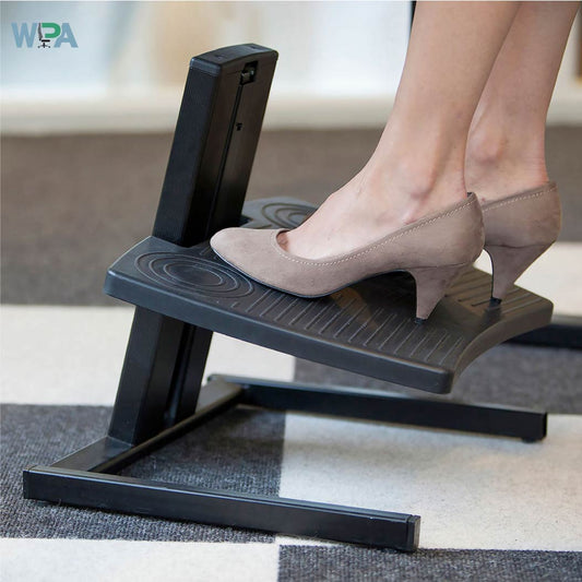 Feet of a women on a footrest looking relax