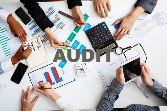 Hands of an employee auditing