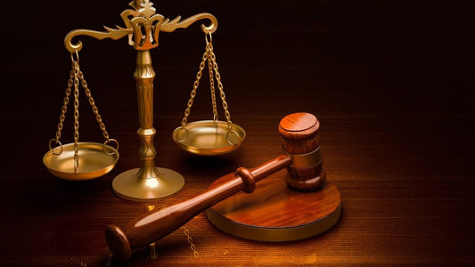 weighing scale image with hammer of justice
