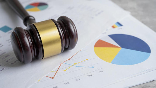 A hammer of justice with a pie graph