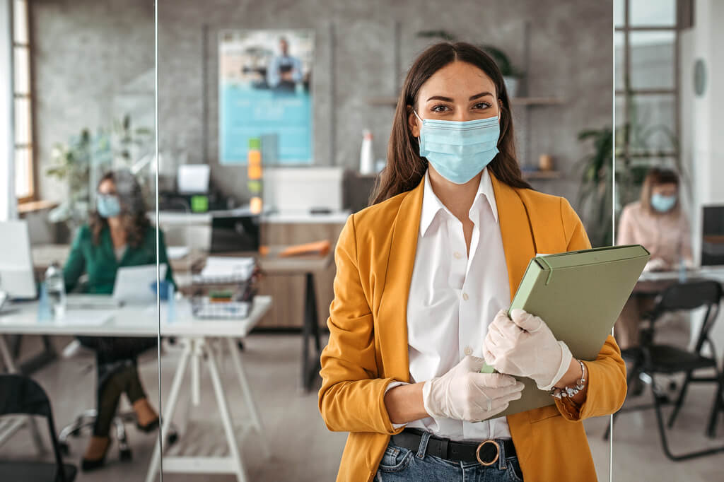 An employee with a face mask