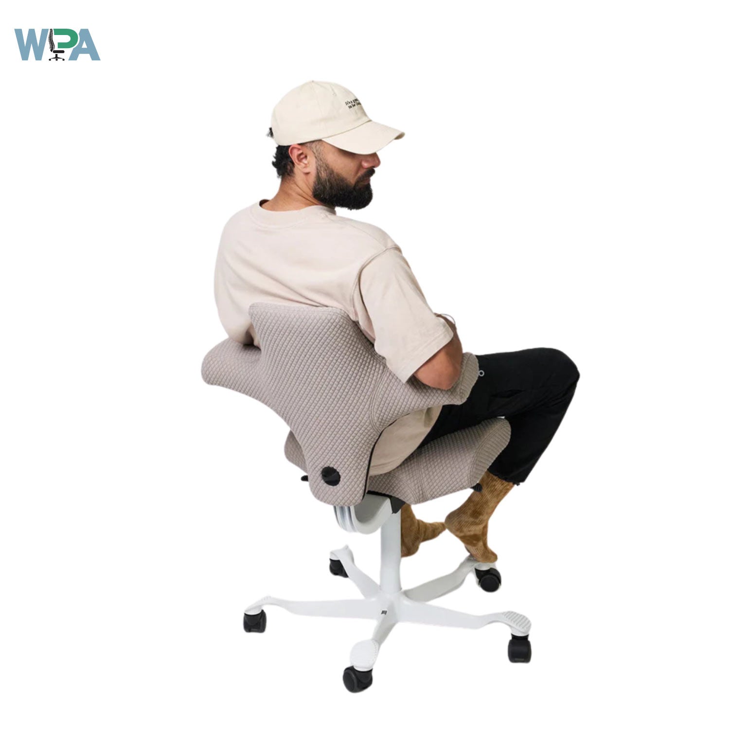 Person sitting on a ergonomic chair with WPA logo in the corner