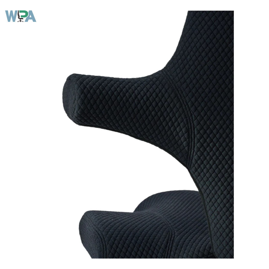 Black quilted armchair on a white background