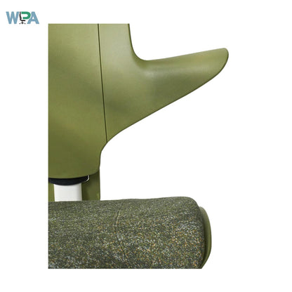 Green rolling object with a textured surface on a white background