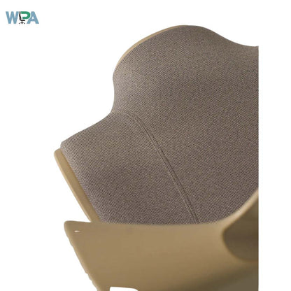 Close-up of a chair with a textured backrest and beige seat on a white background, featuring the Wipa logo.