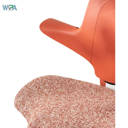 Close-up of a textured orange chair with a white background