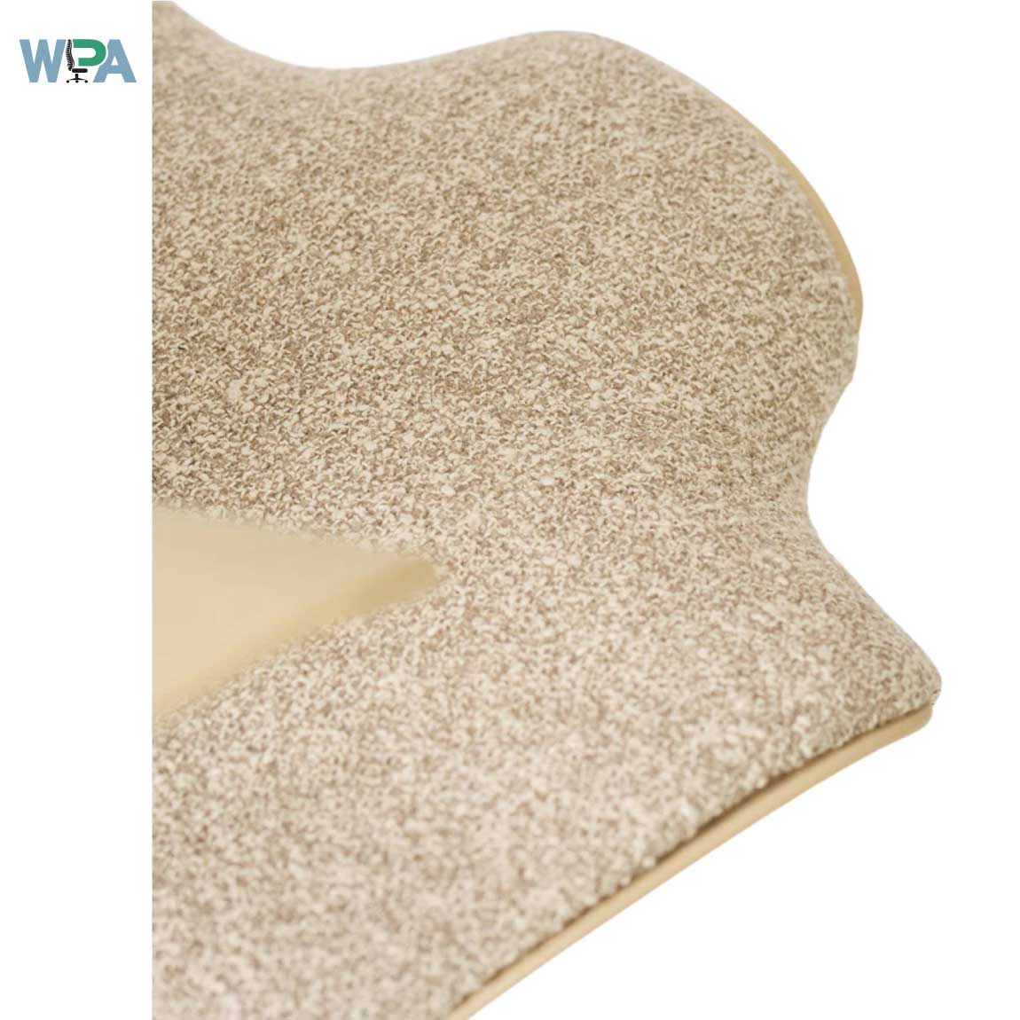 Beige textured material sample on a white background