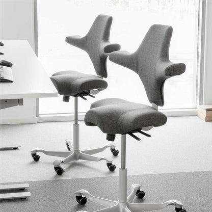 Gray office chairs with white bases in a modern office setting